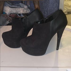 Black suede heeled ankle bootie